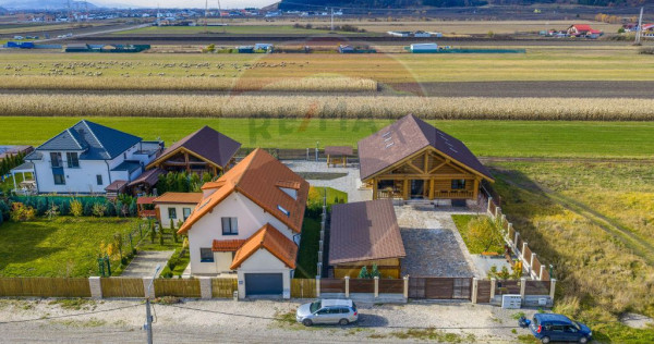 Doua case in stil canadian – confort modern intr-un cad...