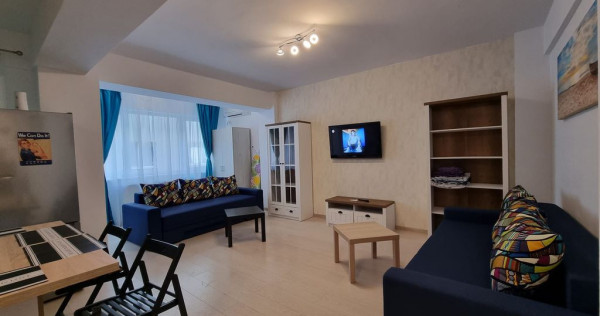 La 2 minute de mare, doua camere decomandate.