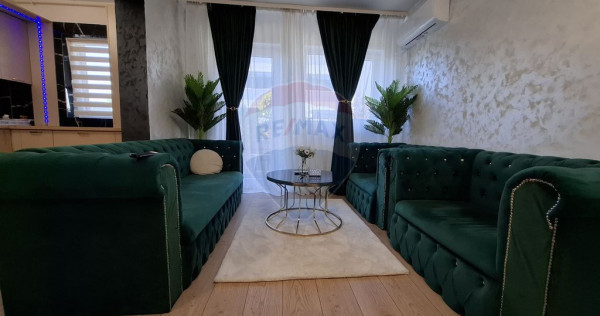 Apartament cu 3 camere cu loc de parcare si curte proprie...