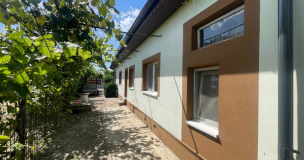 Casa parter, cu 4 camere, 140 mp, teren 1000 mp, zona Simnic