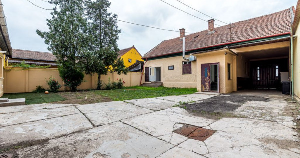 Casa cu potential multiplu cu teren generos pe strada Dunarii