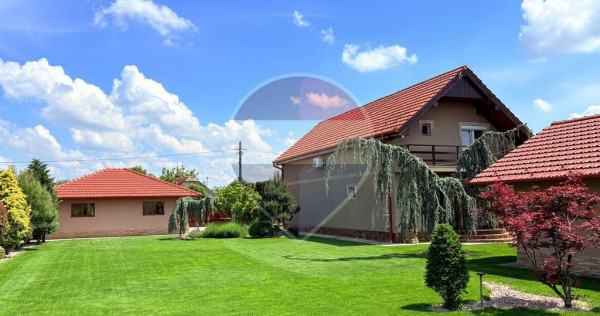 Casă gata de locuit cu teren 2700mp si garaj dublu in Madaras