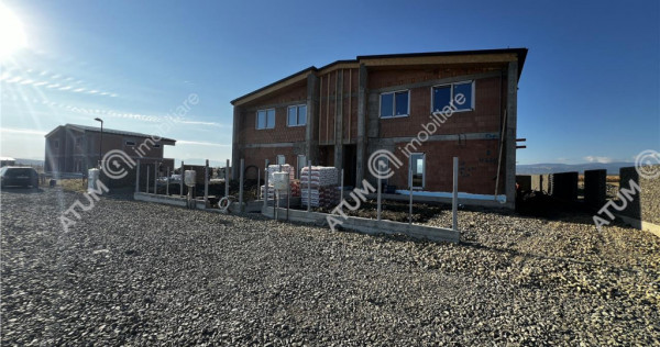 Casa moderna cu 4 camere 3 bai si teren propriu de 350 mp in