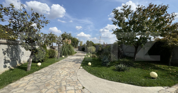 Vilă de 469 mp utili, teren 1.200 mp cu garaj și piscină,