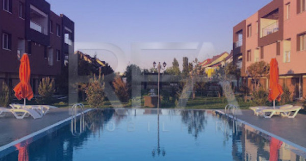 Apartament cu 2 camere, parcare privată și acces la piscin