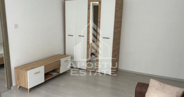 Apartament cu 2 camere,etajul 1, mobilat,centrala proprie...