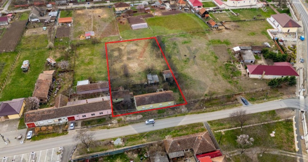Teren generos de 3.105 mp cu construcție, poziție centr...