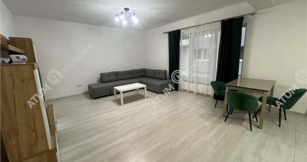 Apartament de 2 camere mobilat si utilat cu loc de parcare i