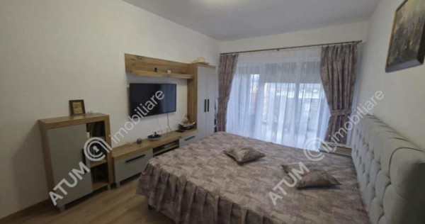 Garsoniera decomandata cu balcon si parcare in zona DaVinci