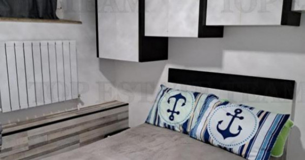 Apartament 2 camere compartimentat parter si demisol, zona