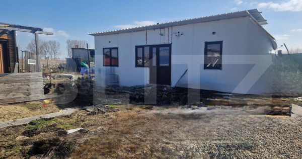 TEREN 520 MP INTRAVILAN +ANEXE-ctie cu panouri sandwich pe