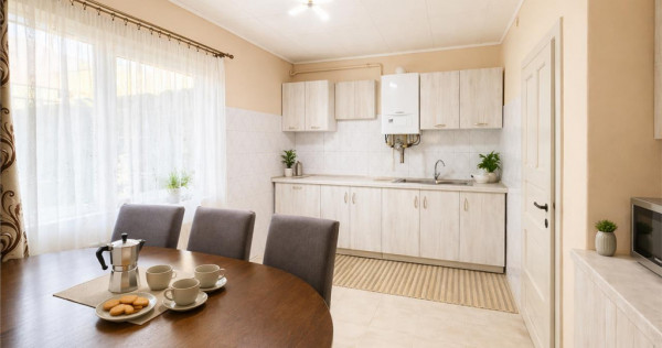 Nivel in casa cu 2 apartamente,145 mp utili teren 338mp, Gh