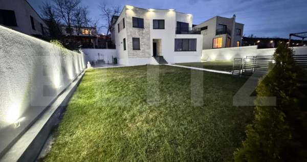 Casa individuala cu 4 camere, 500 mp de teren, garaj de 60 m