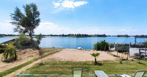 Teren pentru casă de vacanță cu plaja, 1150 mp, zona Apa