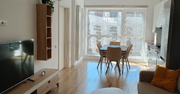 Apartament 2 camere tip studio + loc de parcare + boxa Tractorul
