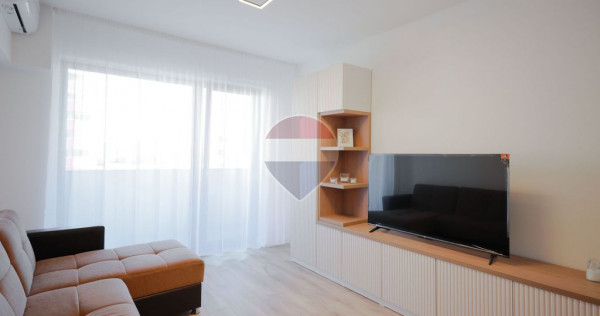 De &icirc;nchiriat apartament cu 2 camere și un loc de parcar...