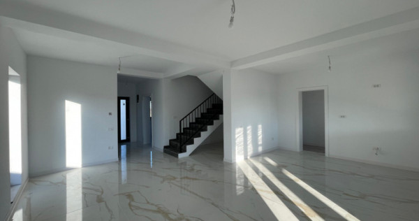 Duplex despartit prin camera tehnica finisaje premium Mosni